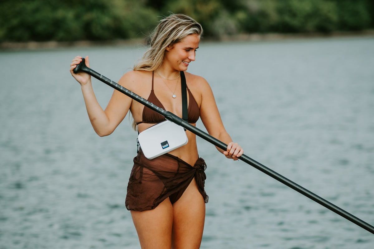 Booē Waterproof Belt Bag worn while paddleboarding